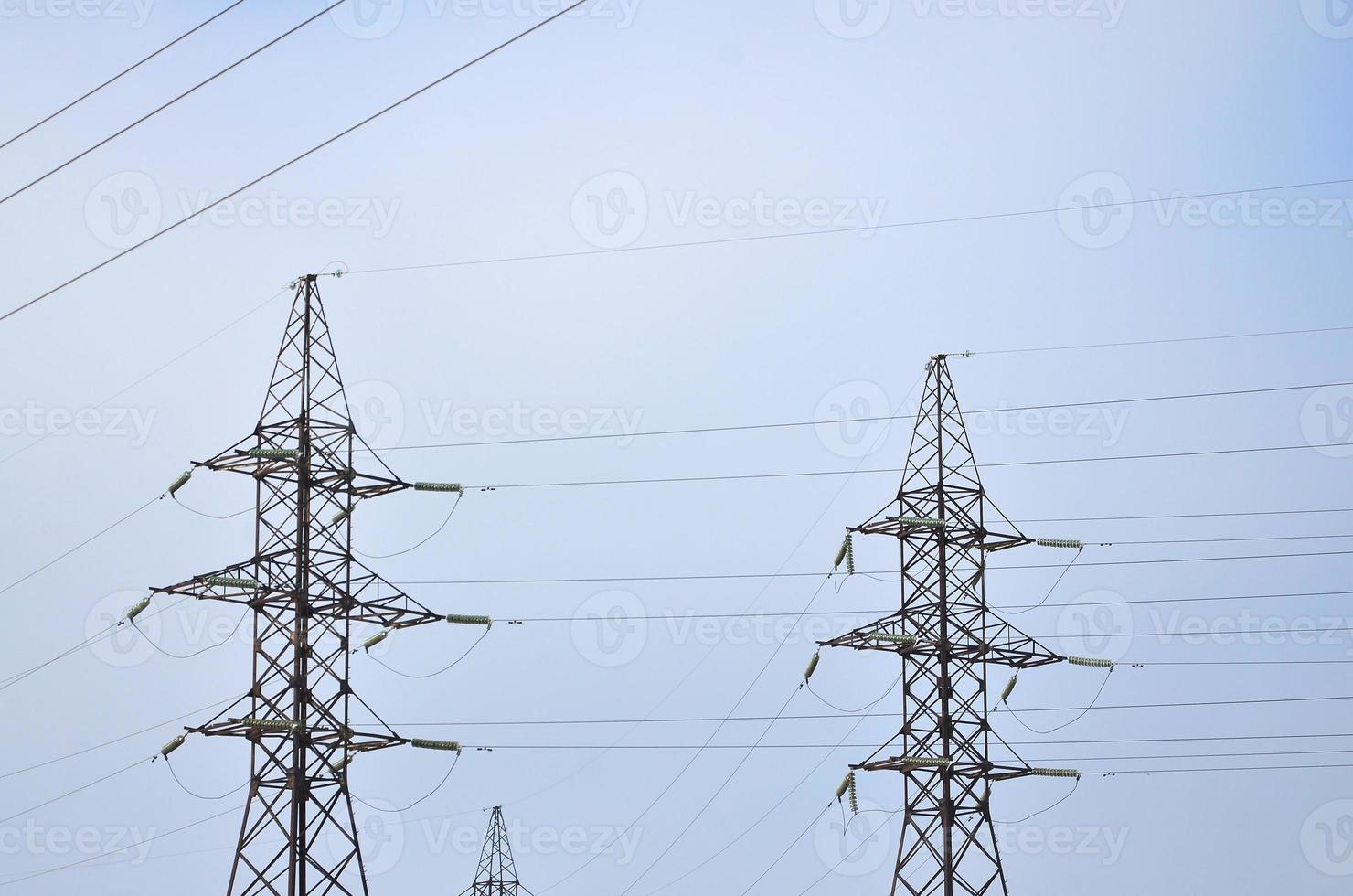 High Voltage Electric Tower. Electricity transmission pylon photo