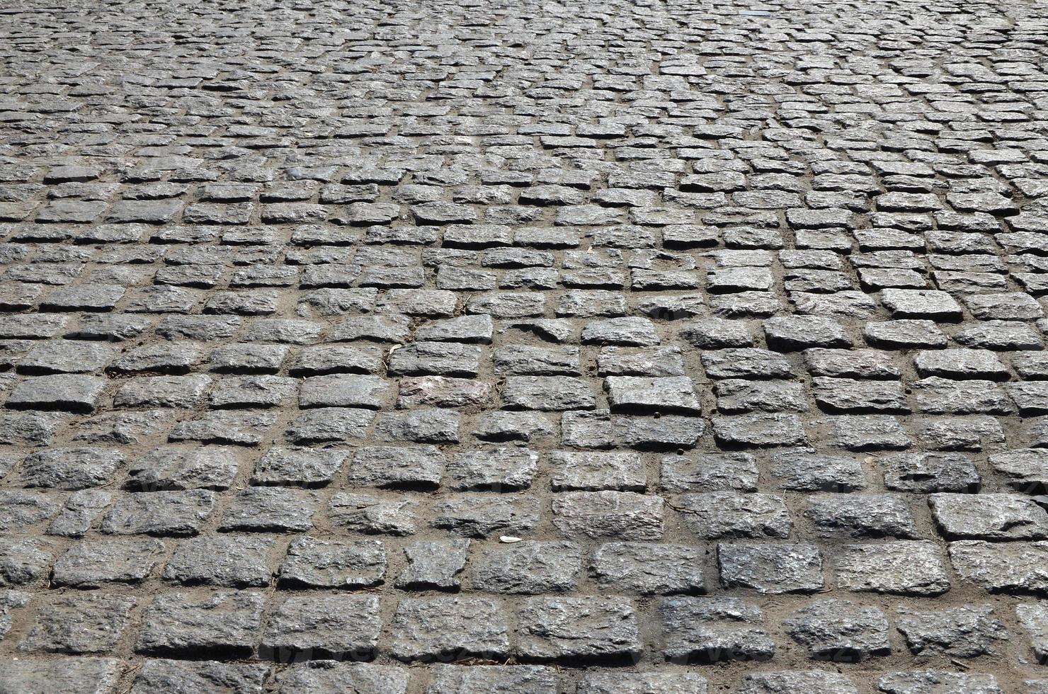 Background photo close-up of a large platform of paving stone in perspective