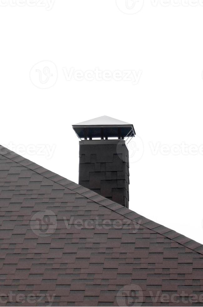 The roof covered with a modern flat bituminous waterproof coating isolated on white photo