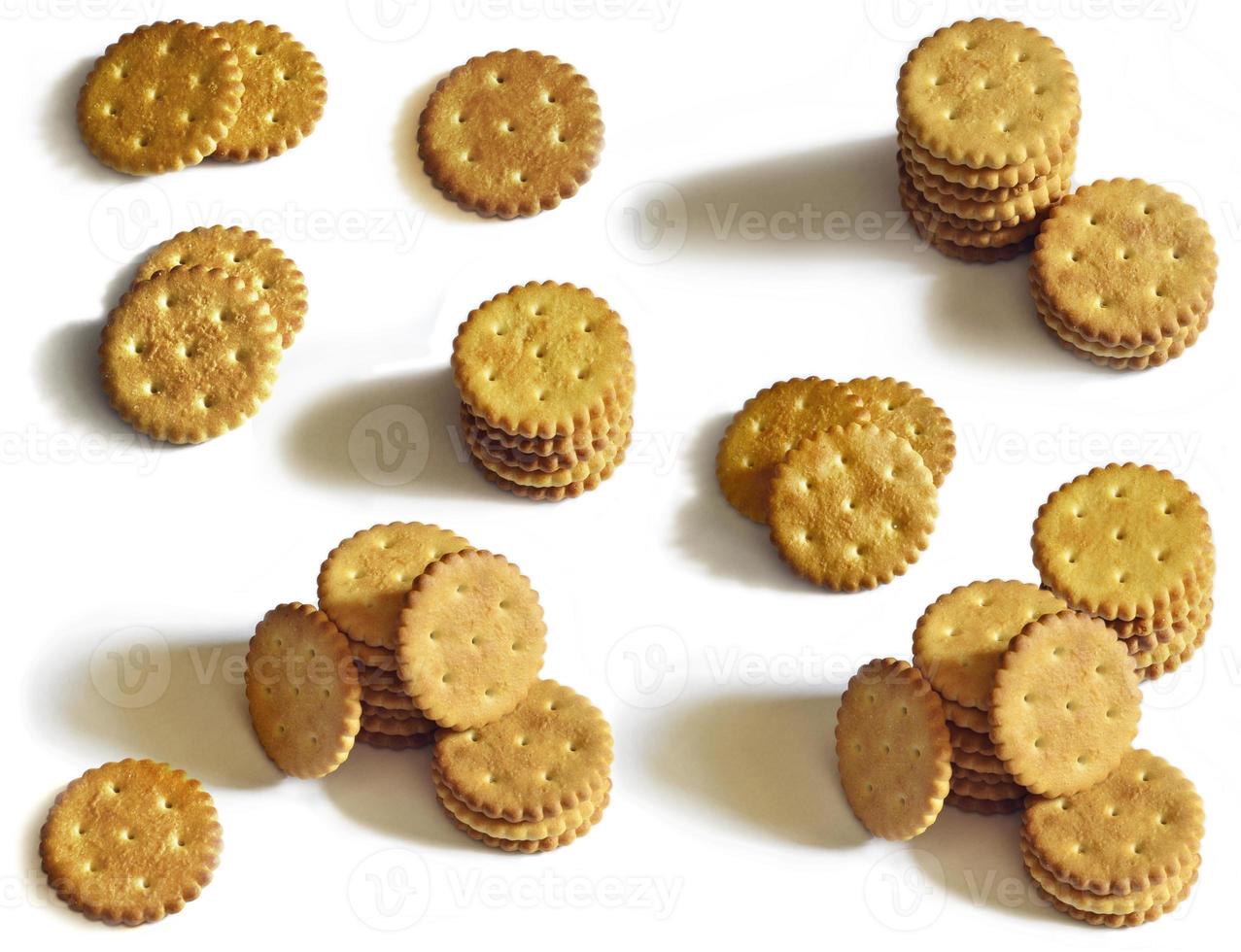 Classic round salted crackers isolated on white photo