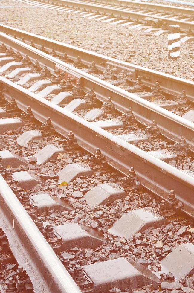 Photo fragment of the railroad tracks in the rainy weather