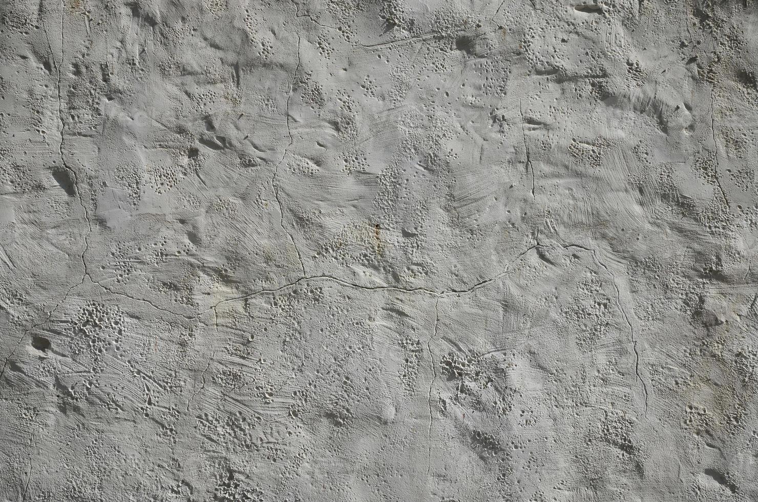 Close up shot of grunge brown clay wall on a old house. The mixture of some other object such as wood and stone photo