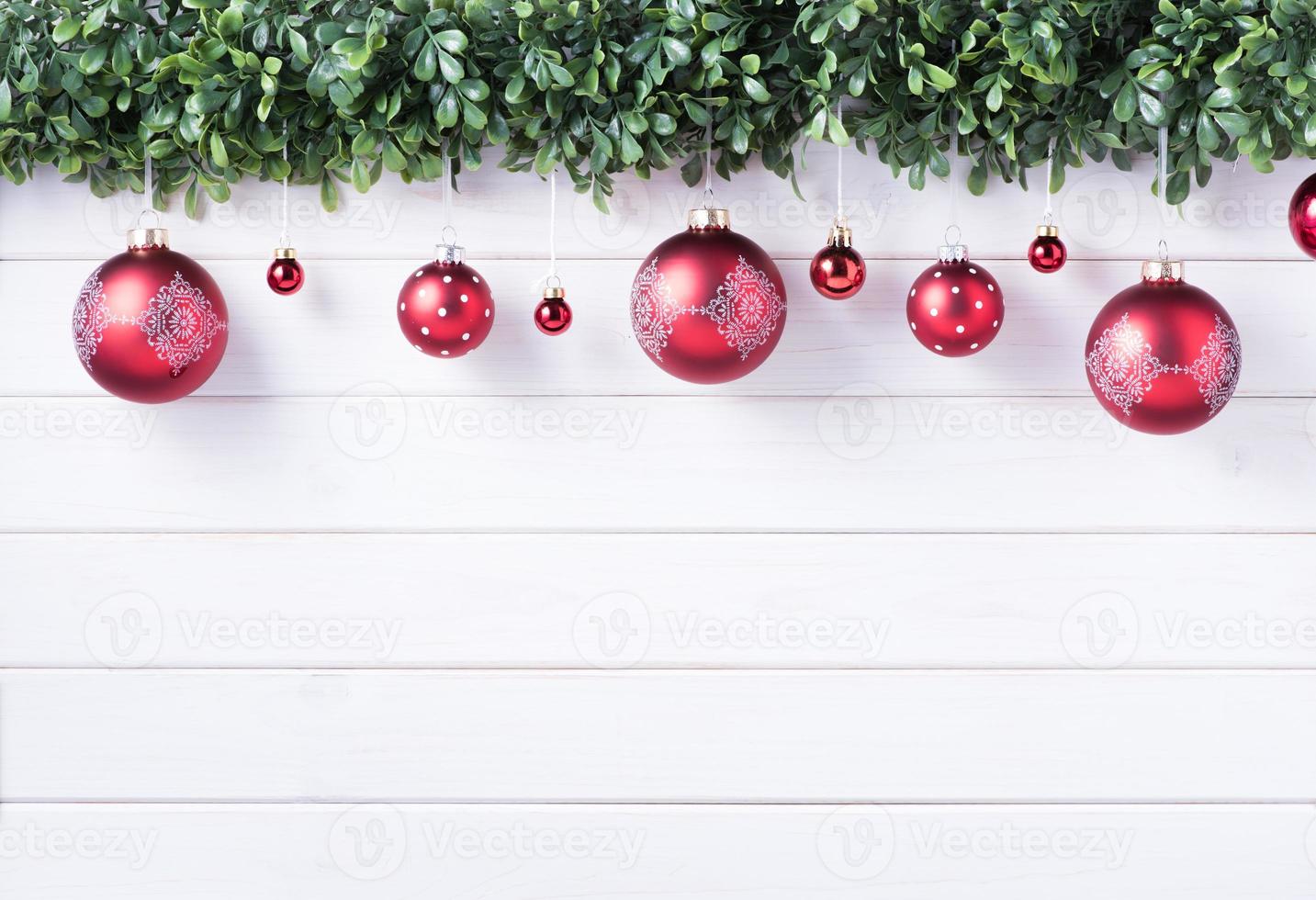 Balls baubles of Merry Christmas and Happy New Year decoration for celebration on white wood background with copy space photo