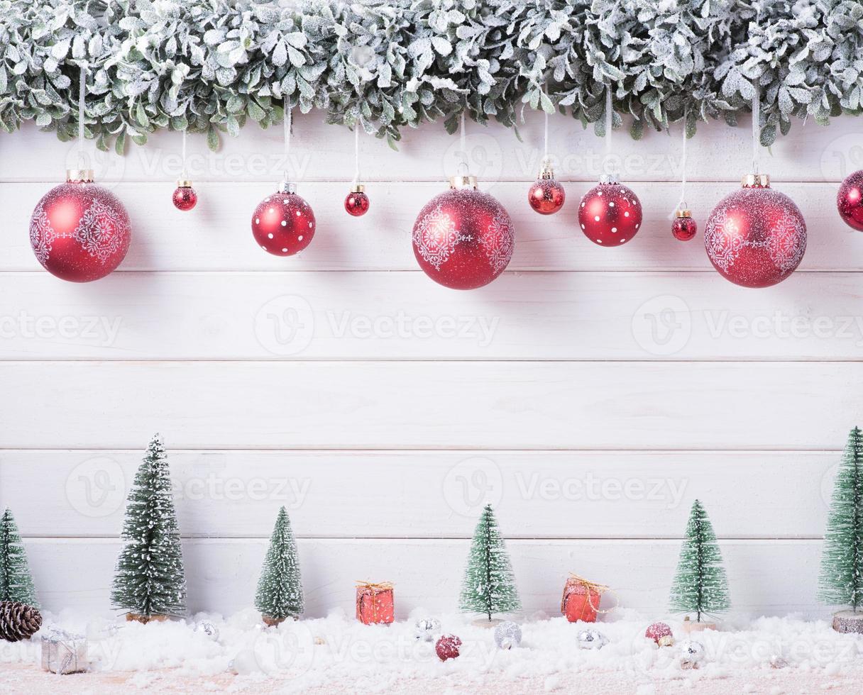 Balls baubles snow of Merry Christmas and Happy New Year decoration for celebration on white wood background with copy space photo