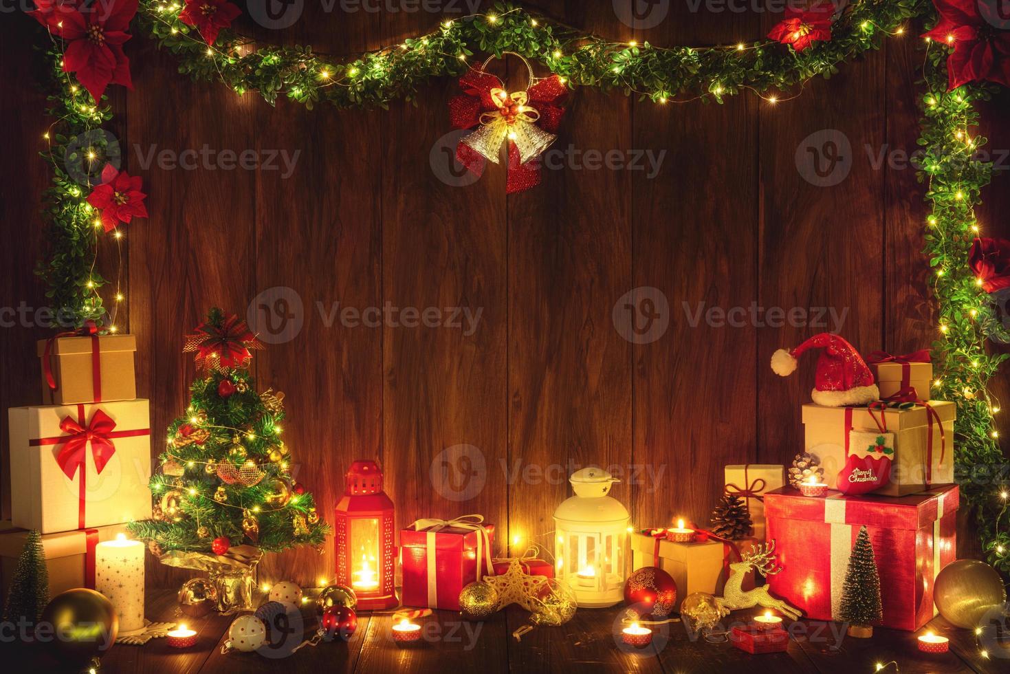 Merry Christmas and Happy New Year decoration with lights for celebration wood background with copy space photo