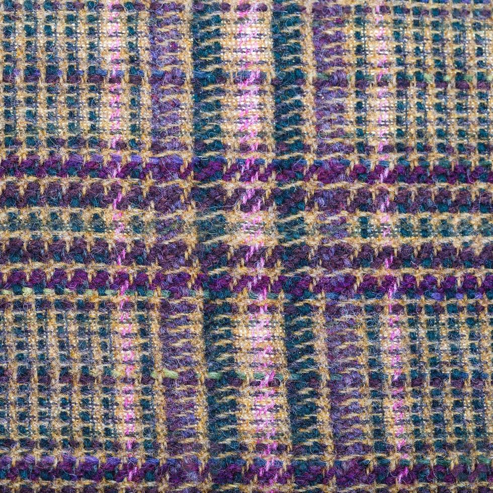 background from green, brown, violet woolen fabric photo