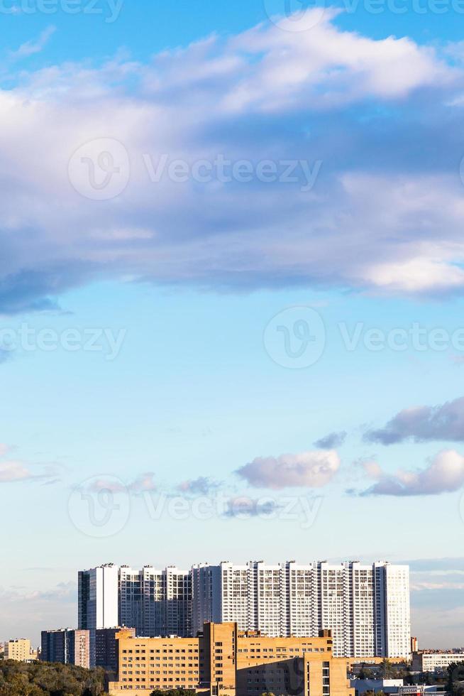 modern apartment buildings under blue sky photo