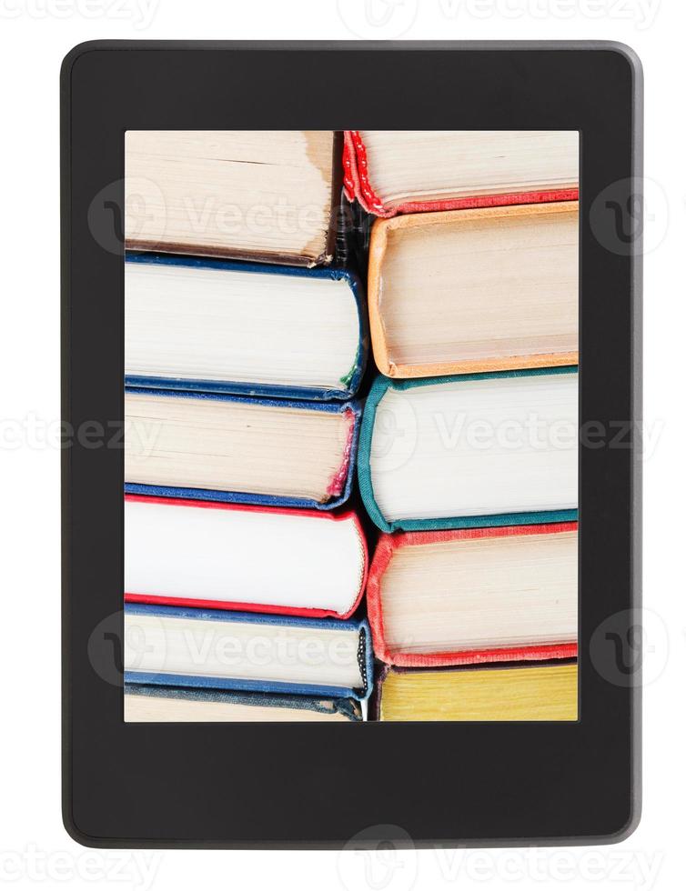 many of books on screen of e-book reader photo