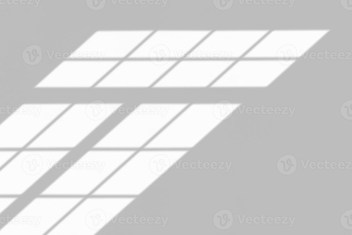 Window shadow drop on white wall background photo