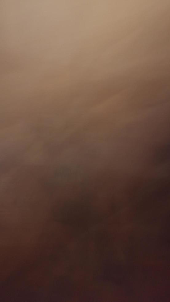 Abstract image and speed in white, orange, brown and red. photo