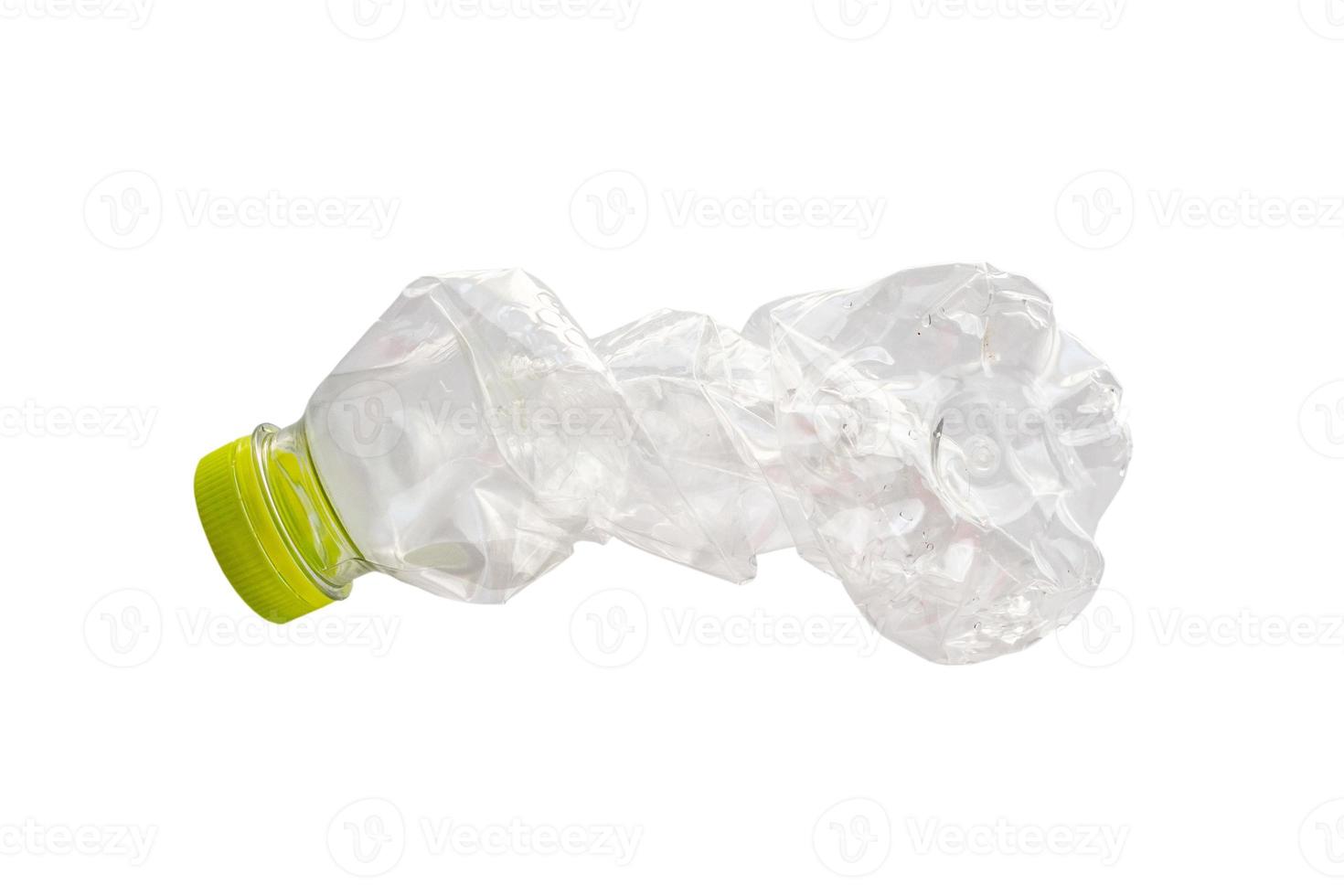 Crushed plastic bottle isolated on white background with clipping path photo