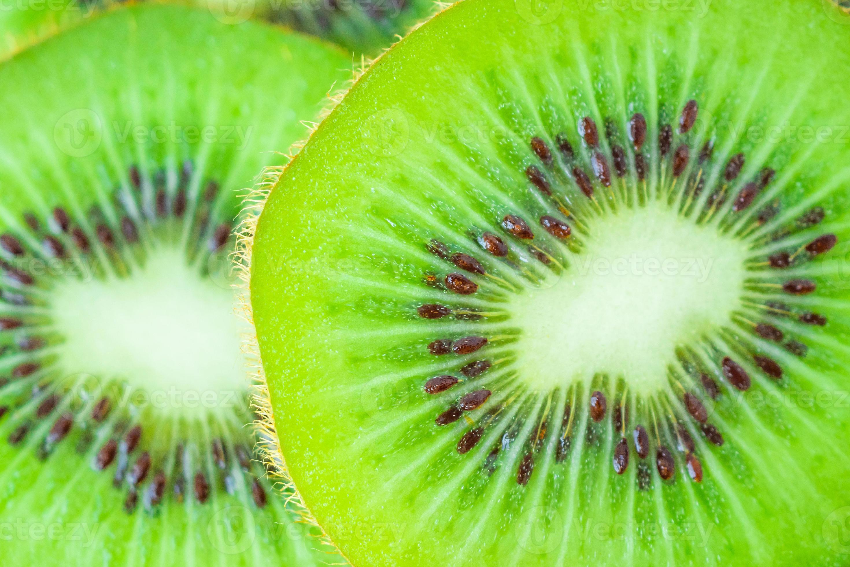 Fresh kiwi fruit slices closeup macro background 12592389 Stock Photo