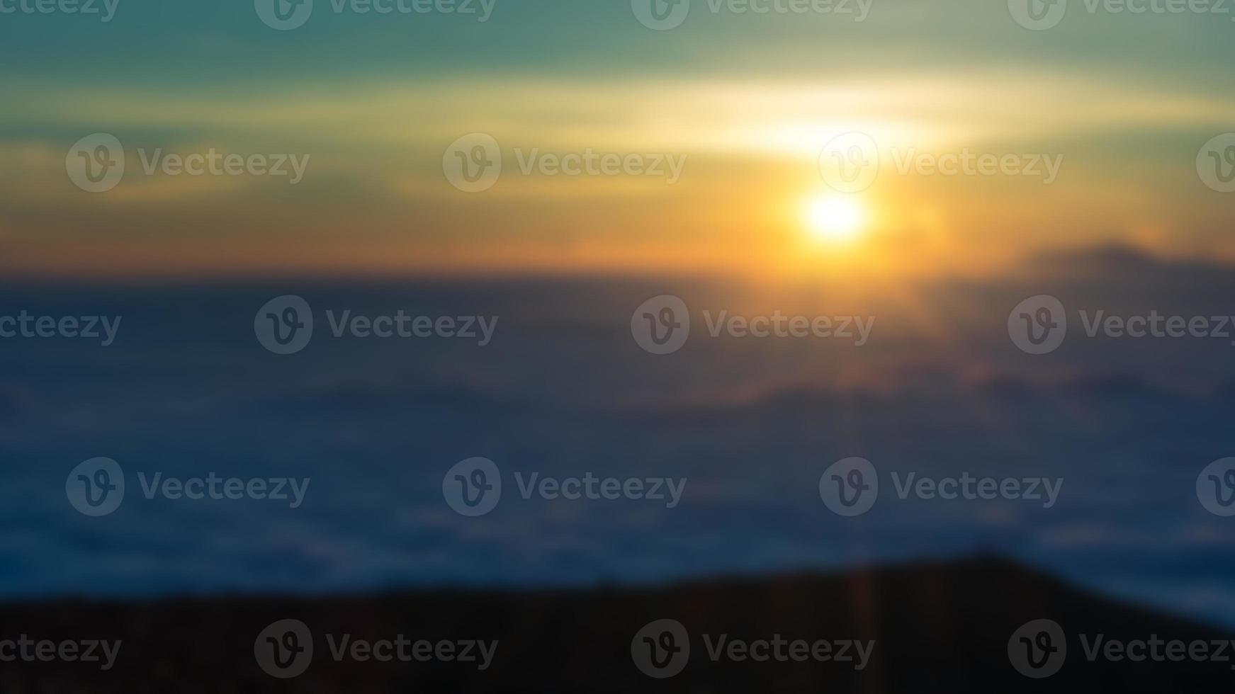 Blurred landscape blue sky with clouds, beautiful fantasy pastel colorful landscape background, gradient sky, sunrise with mountains in distant photo