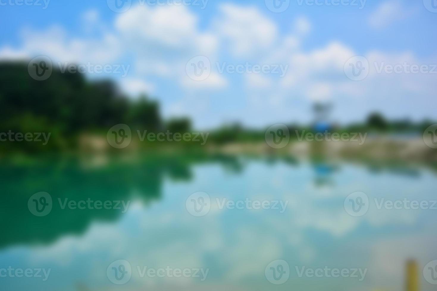 Blur of lake talaga biru background in summer, turqoise nature concept photo