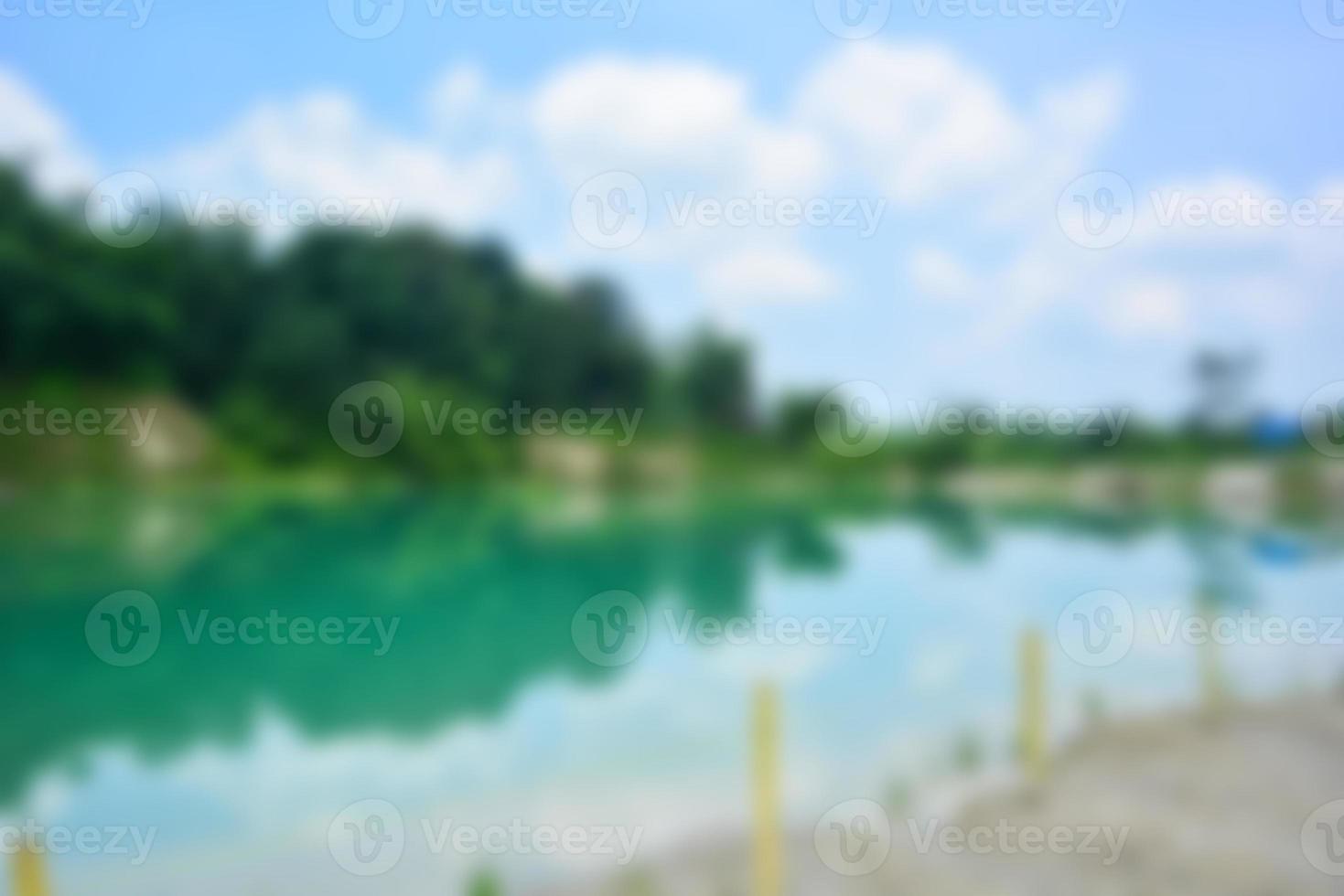 Blur of lake talaga biru background in summer, turqoise nature concept photo