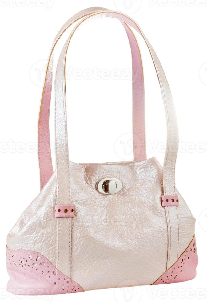 pink leather lady's bag isolated photo