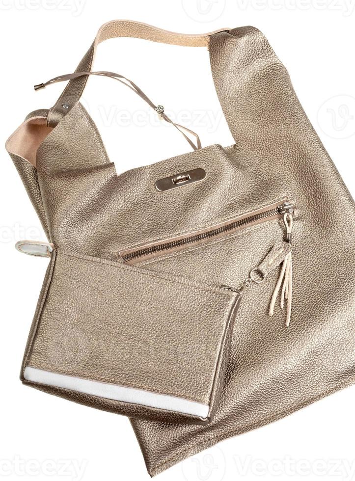 gold brown soft leather woman's bag isolated photo