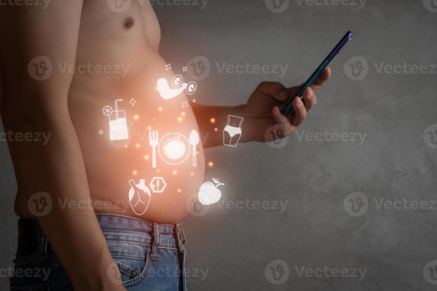 Closeup shot of asian man catch smartphone with jean trousers related vector icon, planning exercise and loss weight for good health in the feature, healthcare and gym concept copy space for text photo