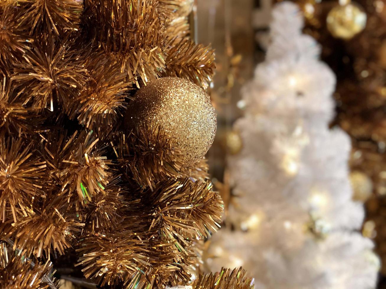 Golden Merry Christmas ball background. Happy new year and merry christmas 2023 photo
