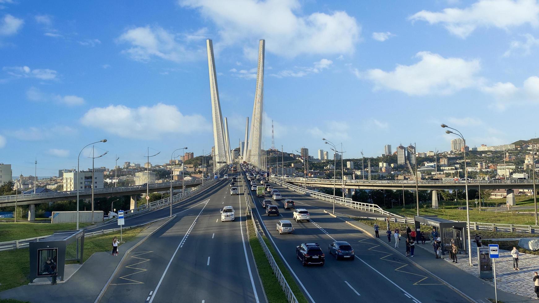 Vladivostok, Russia - September 20, 2022 Urban landscape with a view of the Golden Bridge photo