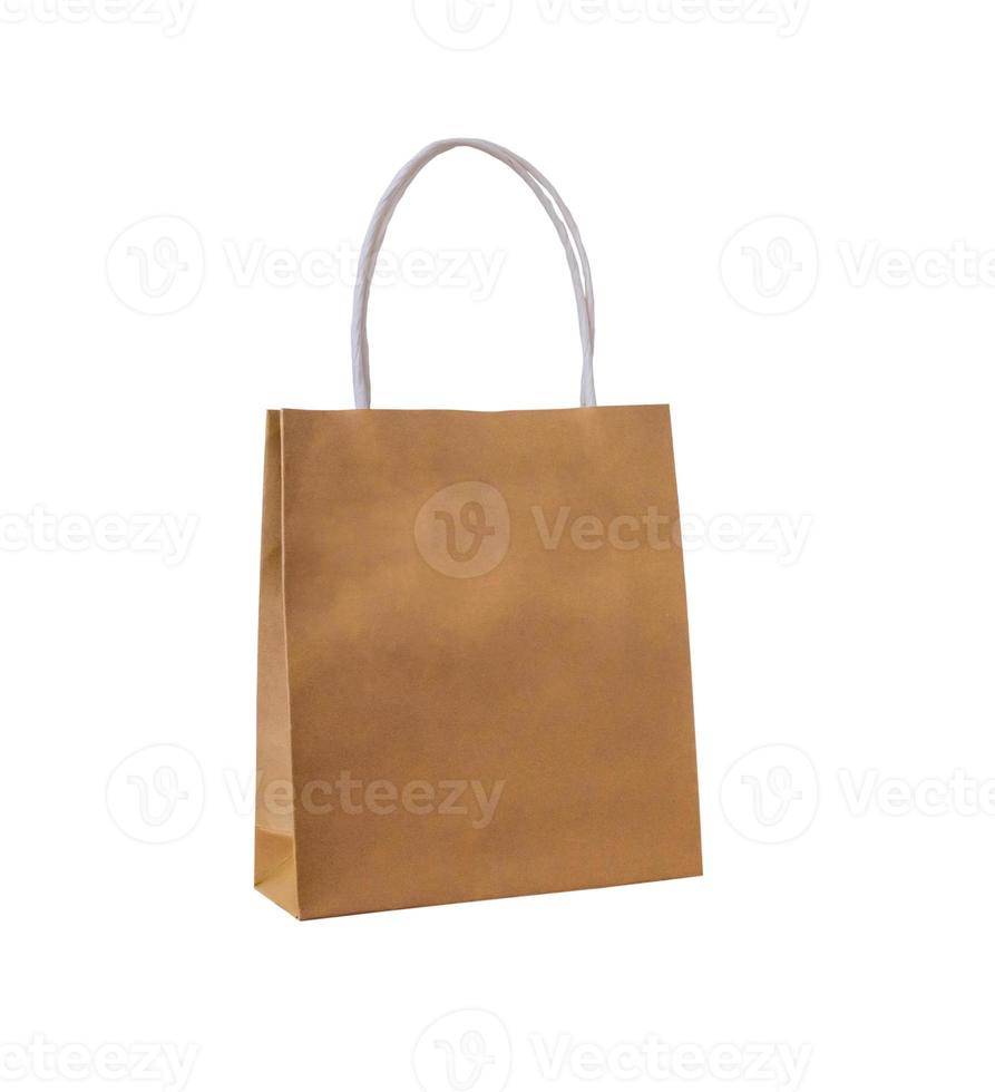 Brown paper shopping bag isolated on white background with clipping path photo