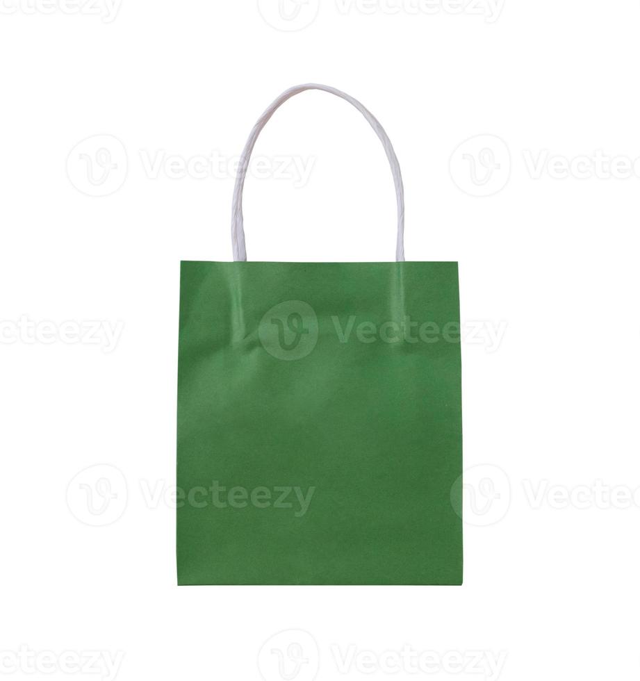 Green paper shopping bag isolated on white background with clipping path photo