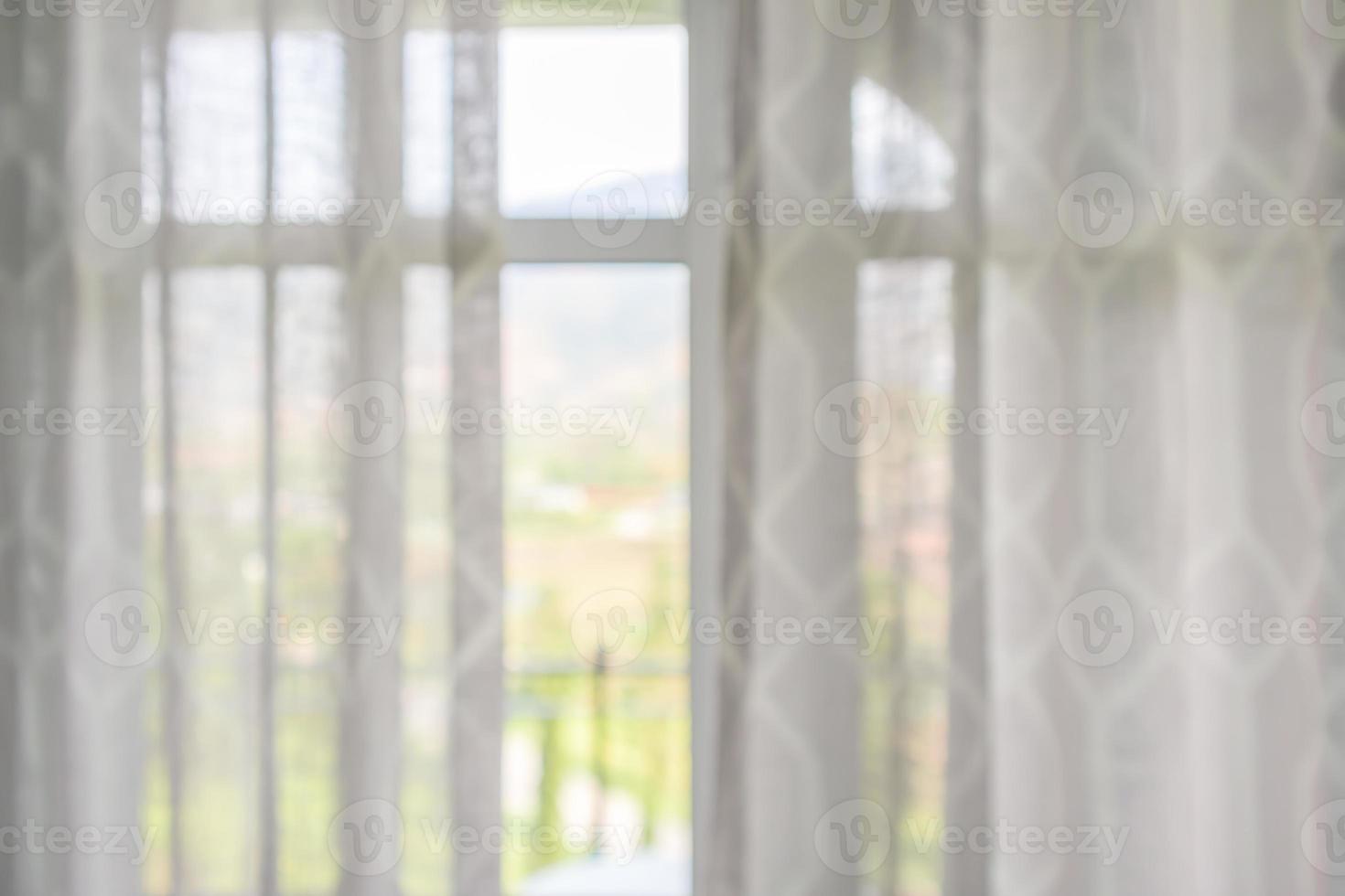window curtain with green garden abstract blur background photo