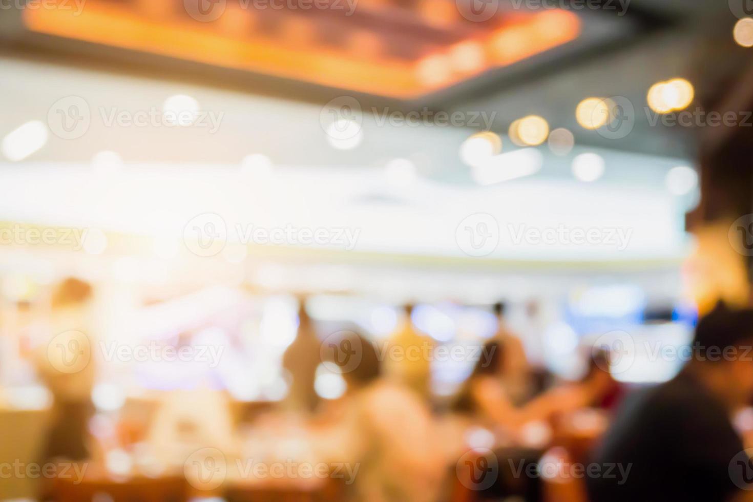 Abstract cafe coffee shoop restaurant blur background with bokeh light photo