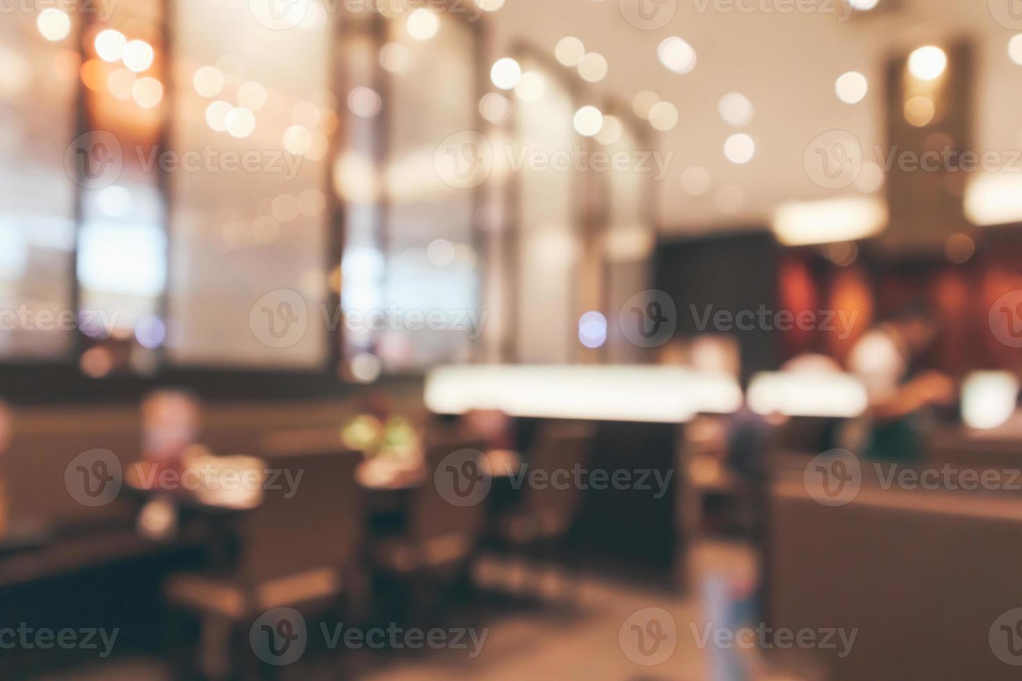 Cafe Restaurant interior with table blur abstract background with bokeh light photo