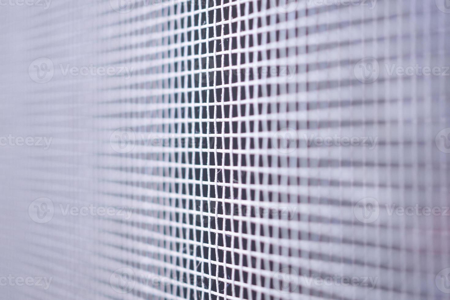 mosquito net wire screen close up on house window protection against insect photo