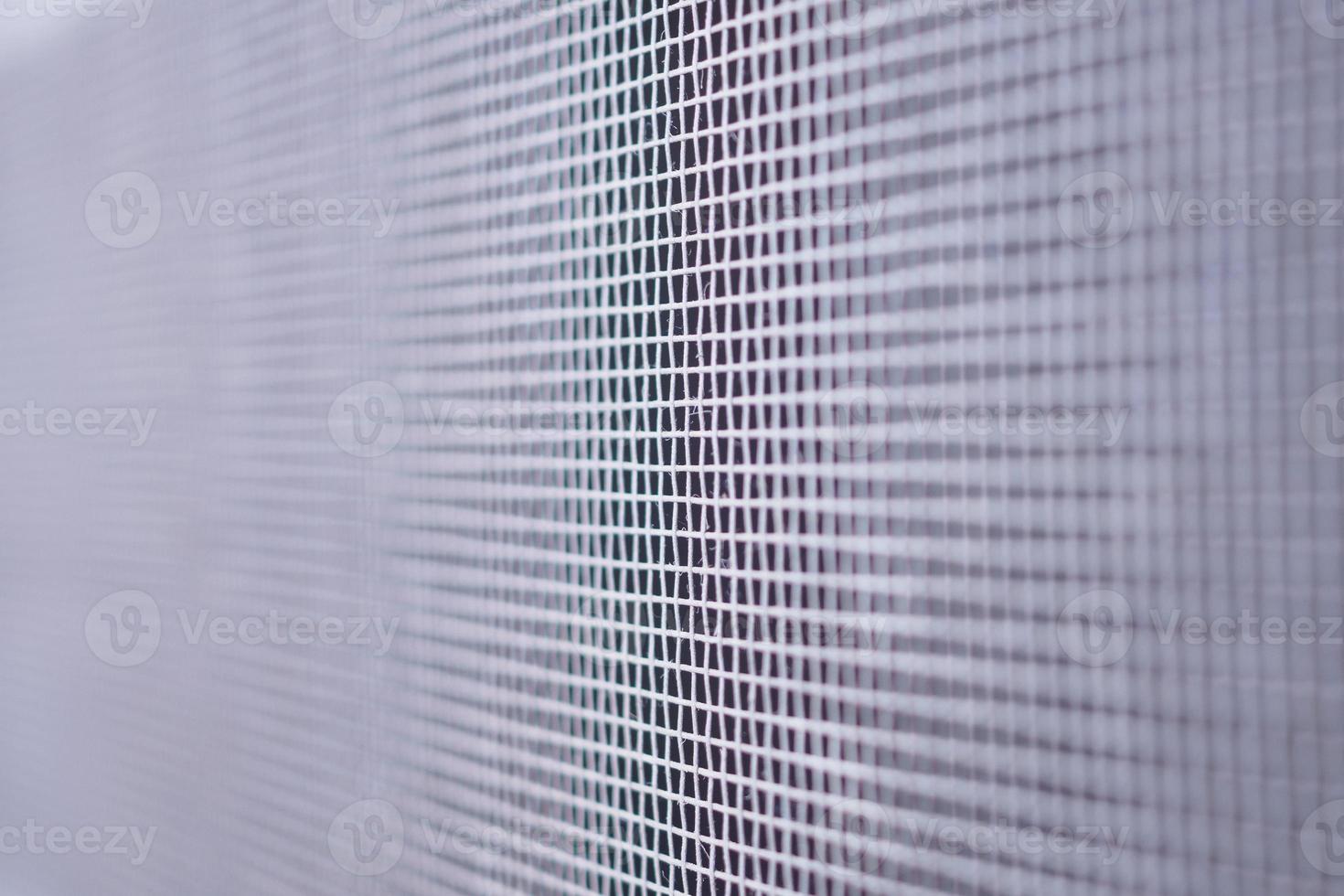 mosquito net wire screen close up on house window protection against insect photo