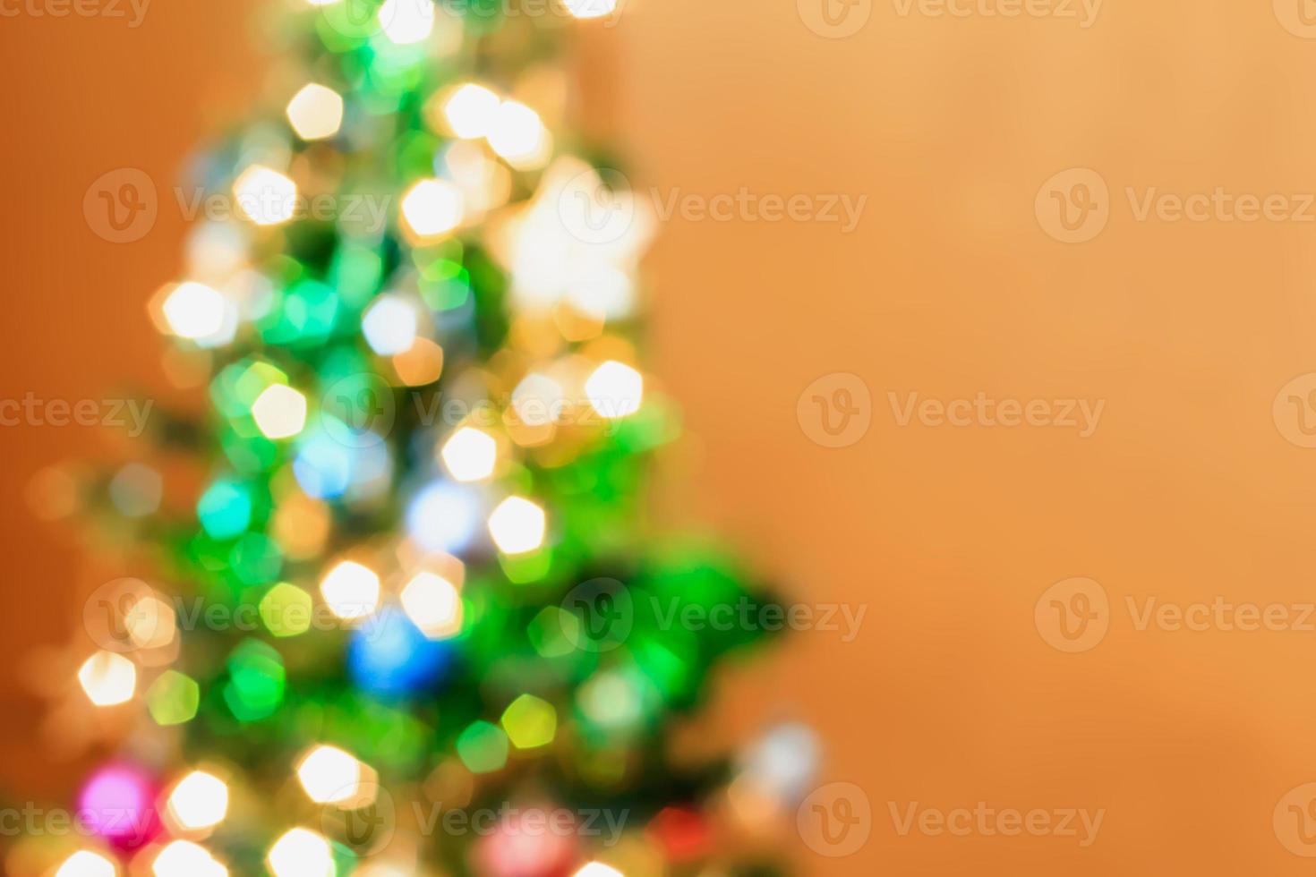 Christmas tree with bokeh light blur background photo