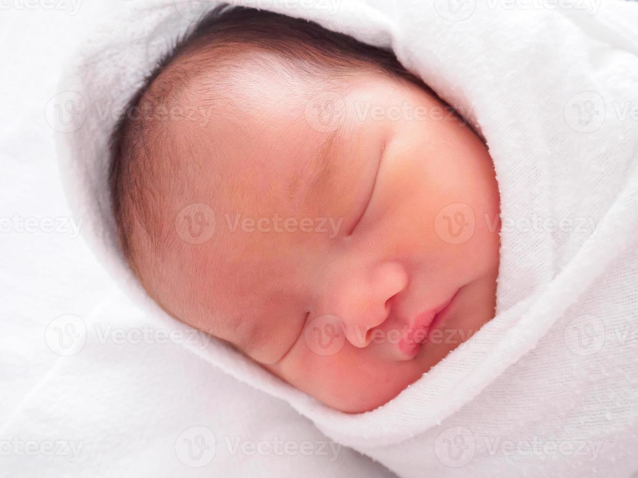 Cute newborn asian baby girl photo