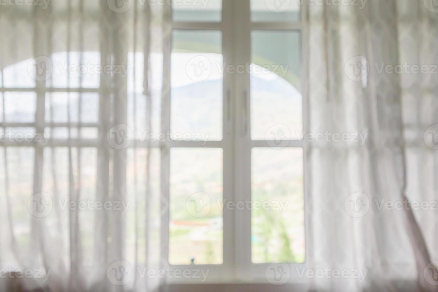 window curtain with green garden abstract blur background photo