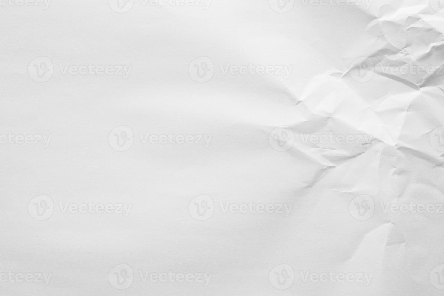 Abstract white crumpled paper texture background photo