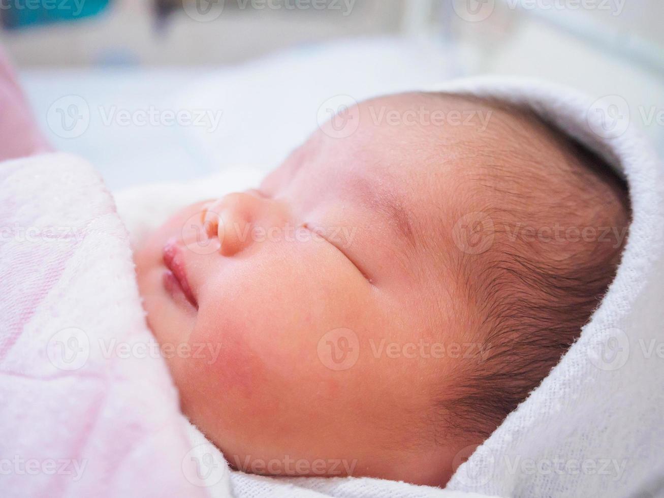 Cute newborn asian baby girl photo