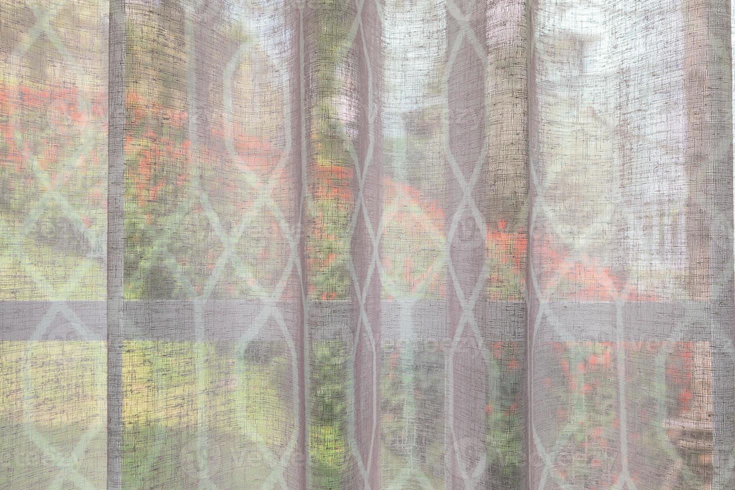 Abstract window curtain with flower garden closeup background photo