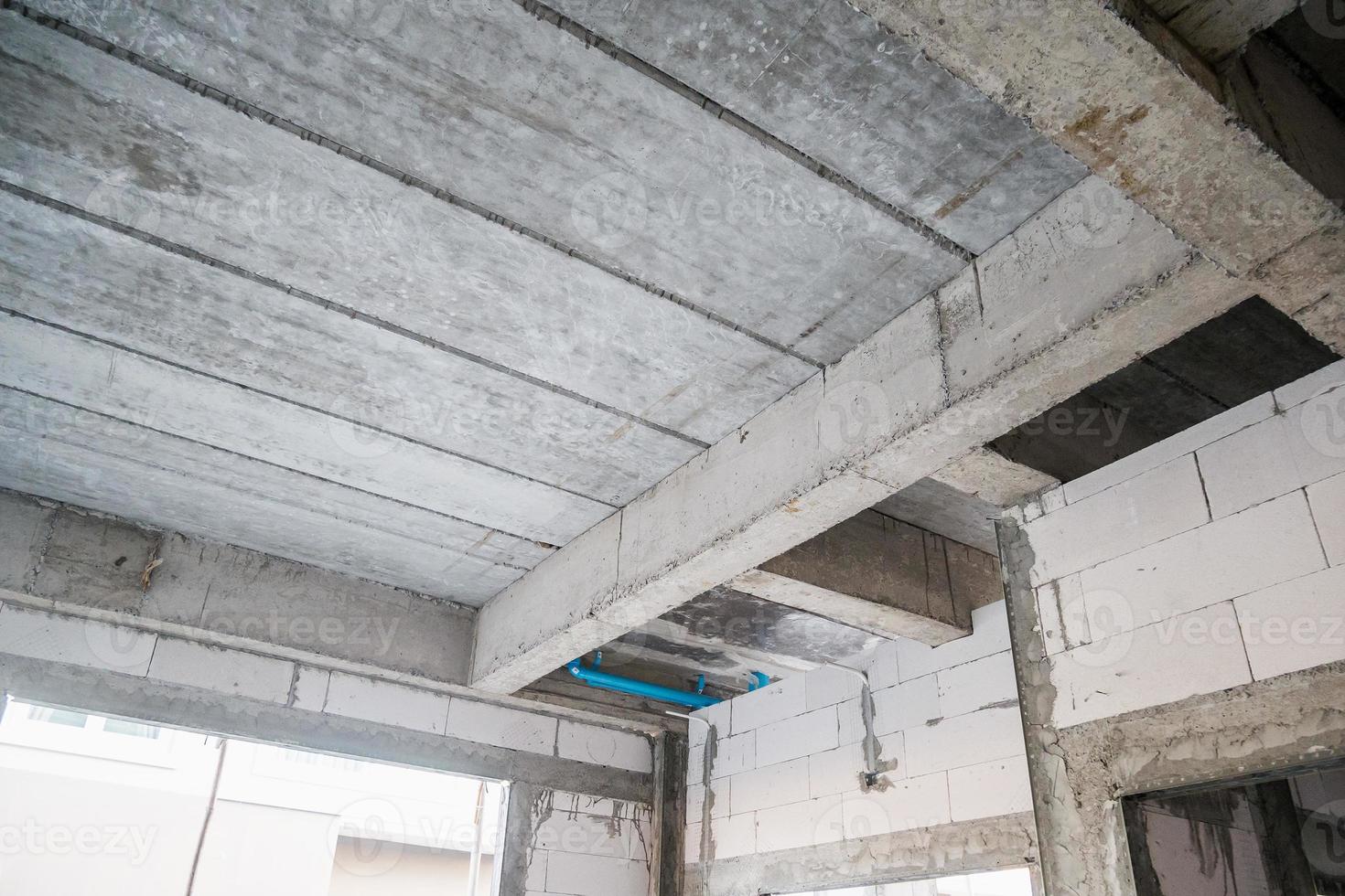 reinforced concrete slabs of residential house building under construction photo