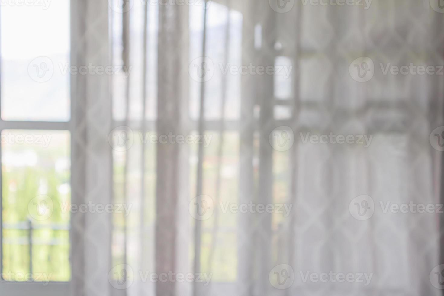 window curtain with green garden abstract blur background photo