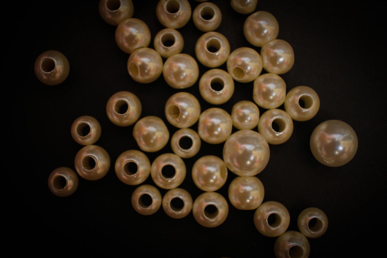 Photos of unique knick knacks made of pearls in perforated