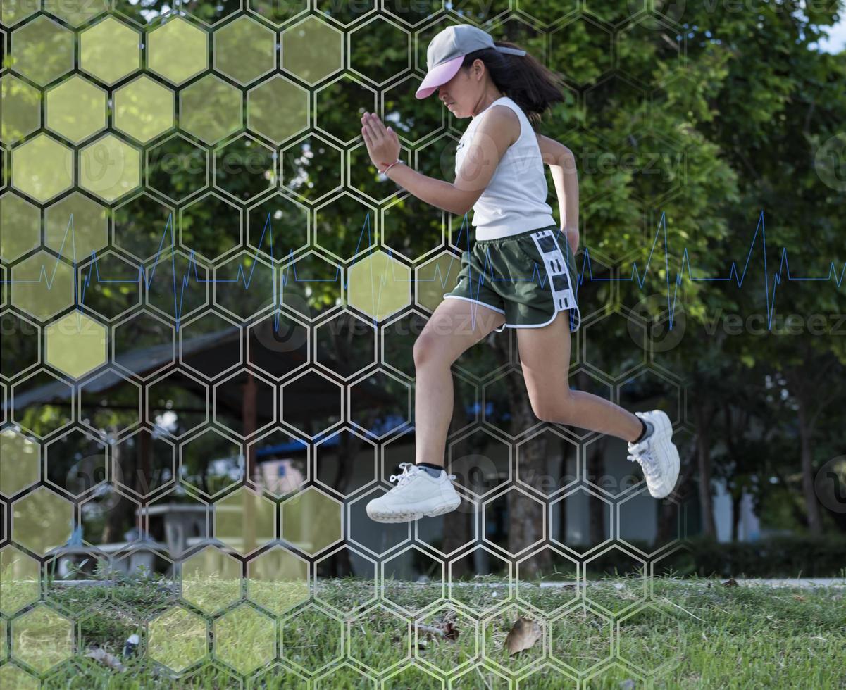 Women are jogging to maintain a healthy body. Technological concepts of running for good health. photo