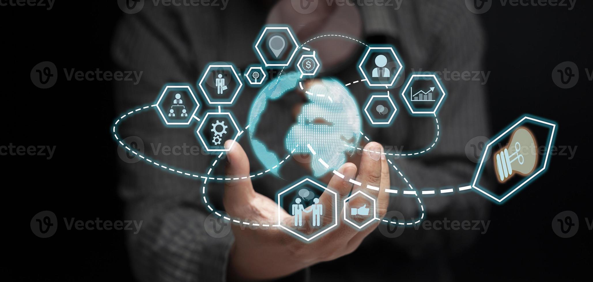businessman's hand Show the concept of business technology in the communication world and work together as an organization through world-class technology. photo