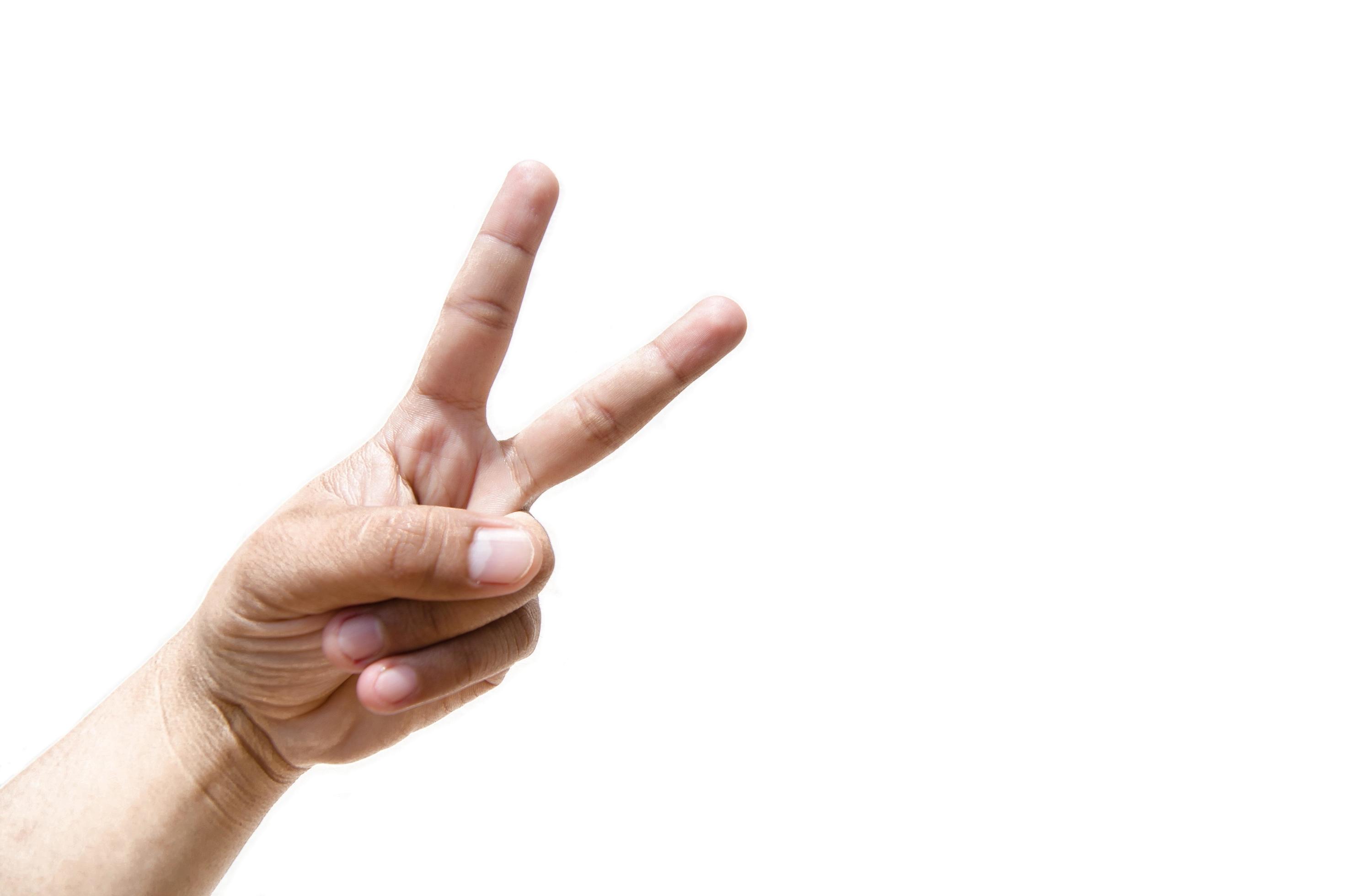 Scissors gesture on left hand for concept of Rock Paper Scissors game