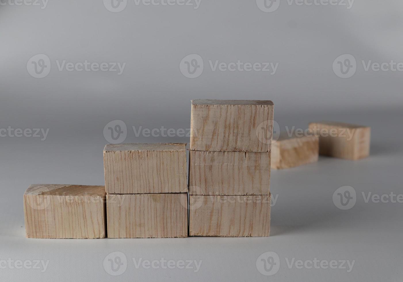 Wood block stacking as step stair. Business concept for growth success process. photo