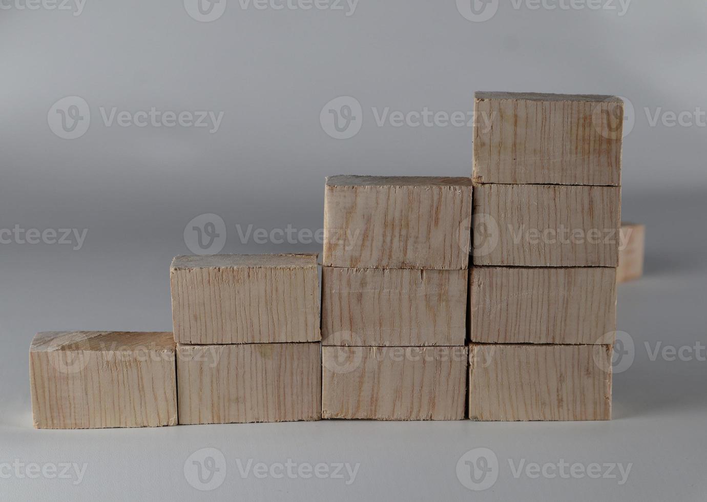 Wood block stacking as step stair. Business concept for growth success process. photo