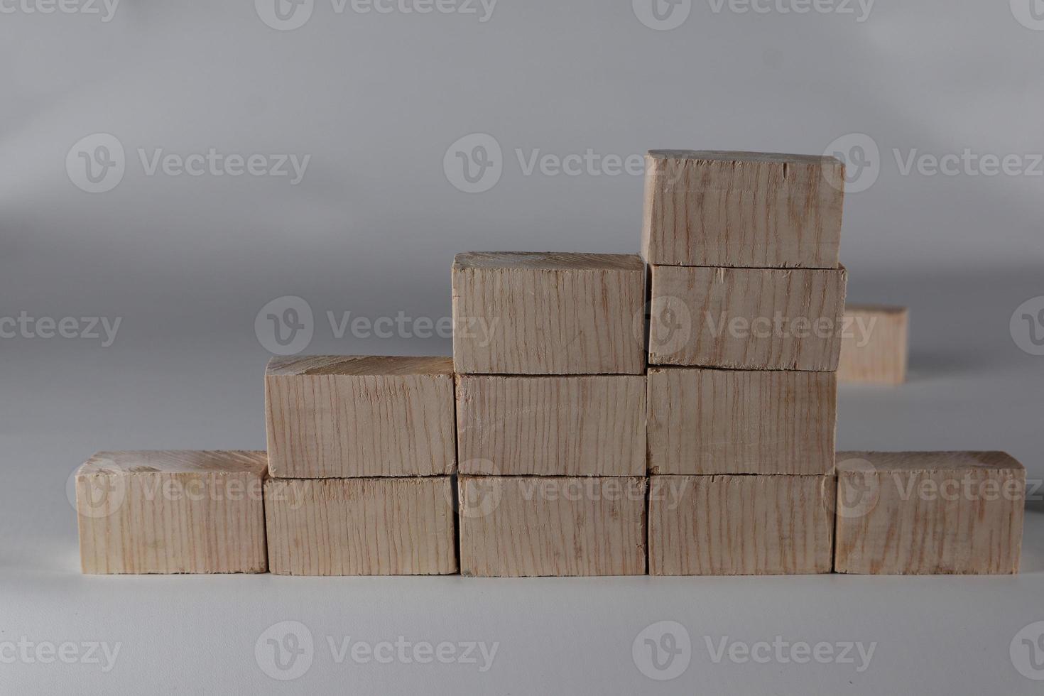 Wood block stacking as step stair. Business concept for growth success process. photo