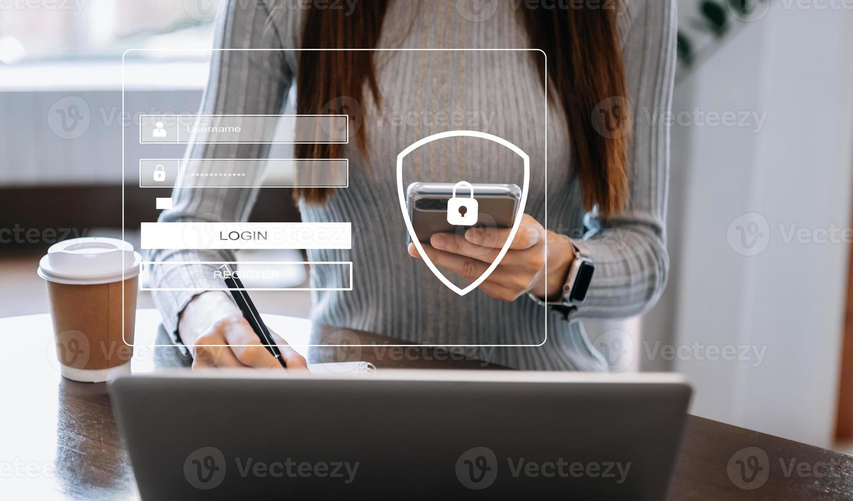 Cyber security concept, Login, User, identification information security and encryption, secure access to user's personal information woman using smart phone and tablet in office photo