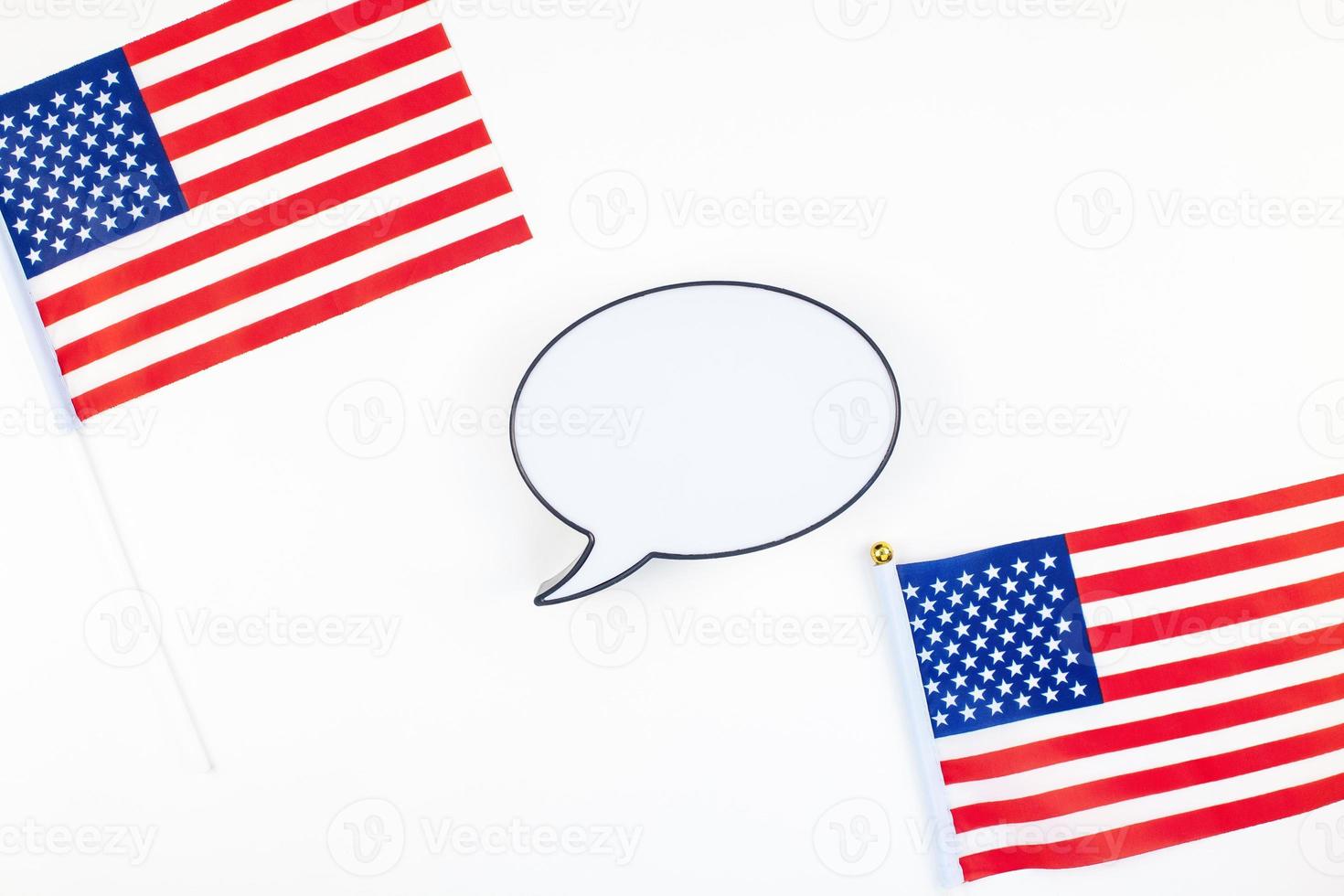 American flags on white background top view photo