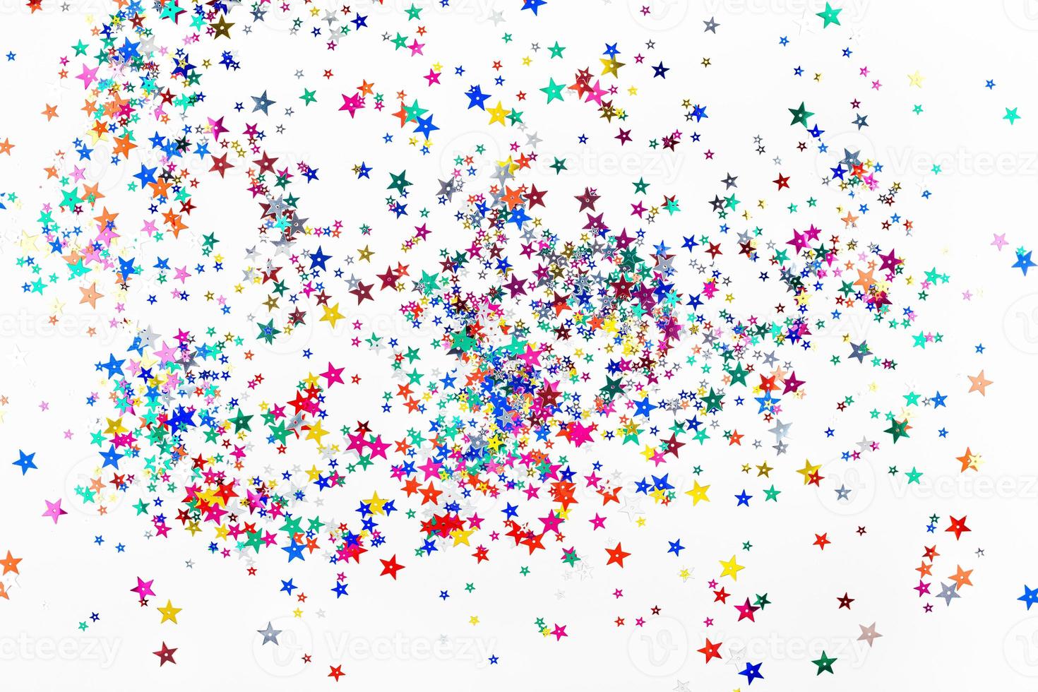 Festive color star confetti texture background photo