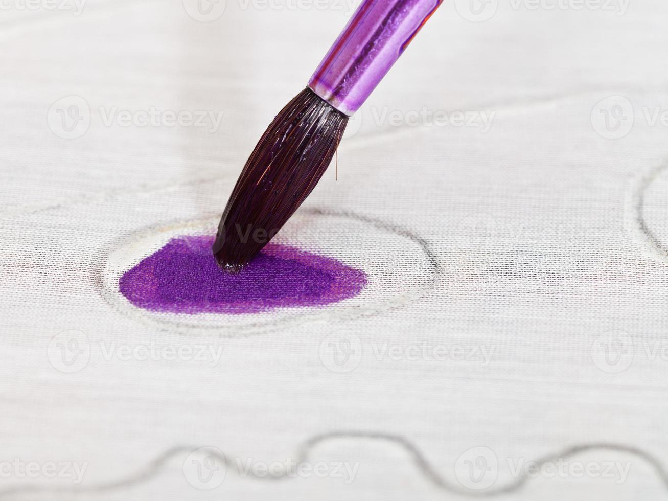 drawing violet ornament on silk canvas photo